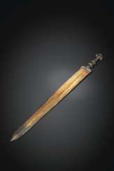 A PARCEL-GILT BRONZE SWORD A PARCEL-GILT BRONZE SWORD