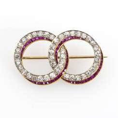 Art Deco double ring brooch with old European cut diamonds and rubies Art Deco double ring brooch with old European cut diamonds and rubies