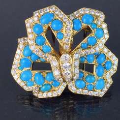 Cartier: a Sensational brooch with over 100 brilliant-cut diamonds, 35 turquoise, in yellow gold 750. Custom-made single stylized flower. Cartier: a Sensational brooch with over 100 brilliant-cut diamonds, 35 turquoise, in yellow gold 750. Custom-made single stylized flower.