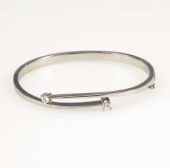 A modern bangle bracelet with diamonds A modern bangle bracelet with diamonds
