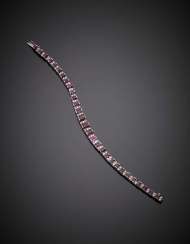 Graduated step cut ruby and diamond white gold bracelet Graduated step cut ruby and diamond white gold bracelet