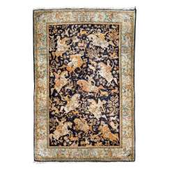 Oriental rug made of silk. 20. Century, 223x144 cm. Oriental rug made of silk. 20. Century, 223x144 cm.