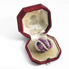C. E. Bolin: A Russian ruby- and diamond brooch set with numerous oval-cut rubies and rose and old Europian-cut diamonds, mounted in 18k gold. C. 1900. (3). C. E. Bolin: A Russian ruby- and diamond brooch set with numerous oval-cut rubies and rose and old Europian-cut diamonds, mounted in 18k gold. C. 1900. (3).