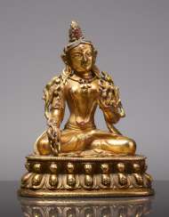 EARLY SMALL BRONZE FIGURE OF WHITE TARA WITH A MAGNIFICENT GOLD PLATING AND RUBIES EARLY SMALL BRONZE FIGURE OF WHITE TARA WITH A MAGNIFICENT GOLD PLATING AND RUBIES