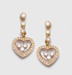 Pair of earrings from Chopard collection Happy Diamonds Pair of earrings from Chopard collection Happy Diamonds