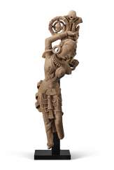 A RARE BUFF SANDSTONE FIGURE OF A SALABHANJIKA A RARE BUFF SANDSTONE FIGURE OF A SALABHANJIKA