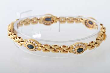 Bracelet yellow gold 18 K with 5 oval fac. Safiren approximately 2.5 cts of 60 Brilliant together approx. of 1.42 cts, TW-W / vsi-si. Bracelet yellow gold 18 K with 5 oval fac. Safiren approximately 2.5 cts of 60 Brilliant together approx. of 1.42 cts, TW-W / vsi-si.