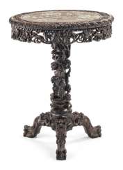 Richly carved table, porcelain plate with figural scenes Richly carved table, porcelain plate with figural scenes