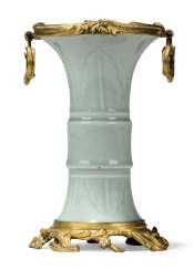 A LOUIS XV ORMOLU-MOUNTED CHINESE PALE CELADON-GLAZED GU-FORM VASE A LOUIS XV ORMOLU-MOUNTED CHINESE PALE CELADON-GLAZED GU-FORM VASE