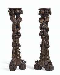 A PAIR OF ITALIAN STAINED WALNUT PEDESTALS A PAIR OF ITALIAN STAINED WALNUT PEDESTALS