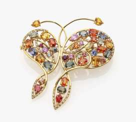 Brooch with diamonds and different colored sapphires Brooch with diamonds and different colored sapphires