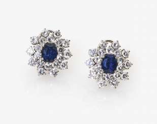 A Pair of stud prong plug with diamonds and sapphires A Pair of stud prong plug with diamonds and sapphires