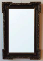 Mirror with floral decor on the edge. Mirror with floral decor on the edge.