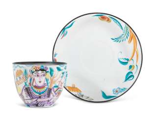 A SOVIET PORCELAIN CUP AND SAUCER A SOVIET PORCELAIN CUP AND SAUCER