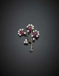 Three oval ruby and diamond bi-coloured gold flower brooch Three oval ruby and diamond bi-coloured gold flower brooch