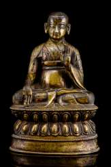 Fine and rare Bronze of a Lama SANS.RGYAS.'PHEL with silver and copper deposits Fine and rare Bronze of a Lama SANS.RGYAS.'PHEL with silver and copper deposits