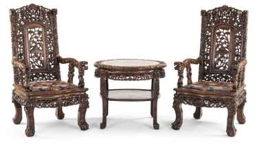 Two richly carved armchairs, side chairs, daybed, column, and table with marble top Two richly carved armchairs, side chairs, daybed, column, and table with marble top