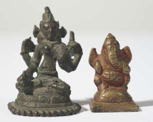 Two small figures of Sara and father of Ganesha Two small figures of Sara and father of Ganesha