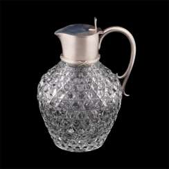 A decanter. Silver, crystal carving A decanter. Silver, crystal carving