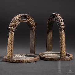 A pair of gold inlaid stirrups from the imperial workshops, China, Qing dynasty A pair of gold inlaid stirrups from the imperial workshops, China, Qing dynasty