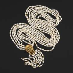 Long, 4-row cultured pearl necklace with emeralds and diamonds Long, 4-row cultured pearl necklace with emeralds and diamonds