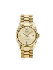 ROLEX OYSTER PERPETUAL DATEJUST: Orologio da polso da uomo in oro 18K con lunetta zigrinata ROLEX OYSTER PERPETUAL DATEJUST: Orologio da polso da uomo in oro 18K con lunetta zigrinata
