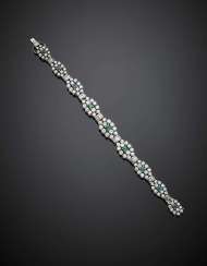 Round and baguette diamond in all ct. 10 circa with emerald white gold bracelet Round and baguette diamond in all ct. 10 circa with emerald white gold bracelet