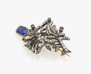Brooch with sapphire and diamonds Brooch with sapphire and diamonds