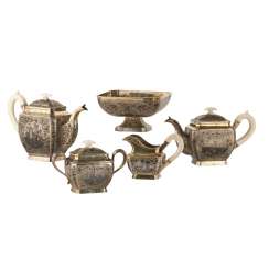 The tea and coffee service of 5 pieces The tea and coffee service of 5 pieces