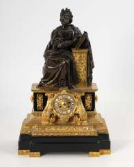 Ornate Bronze mantel clock with a tight figure Ornate Bronze mantel clock with a tight figure