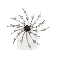 Sapphire and diamond brooch in the Form of a sun Sapphire and diamond brooch in the Form of a sun