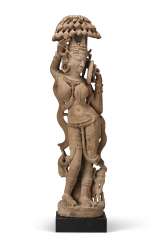 A RARE BUFF SANDSTONE FIGURE OF A SALABHANJIKA A RARE BUFF SANDSTONE FIGURE OF A SALABHANJIKA