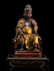 Figure on a throne with colours and gilding, probably Guandi Figure on a throne with colours and gilding, probably Guandi