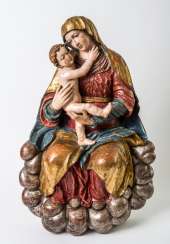 Very large sculpture of Mary with the infant Jesus in the clouds Very large sculpture of Mary with the infant Jesus in the clouds