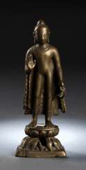 Bronze of Buddha Shakyamuni with silver deposits on a Lotus Bronze of Buddha Shakyamuni with silver deposits on a Lotus