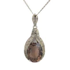 FAHRNER Pendentif et Chaîne ovale quartz fumé environ 30ct . FAHRNER Pendentif et Chaîne ovale quartz fumé environ 30ct .
