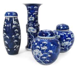 Two underglaze blue ginger pots, two vases and cover with Prunus decor Two underglaze blue ginger pots, two vases and cover with Prunus decor