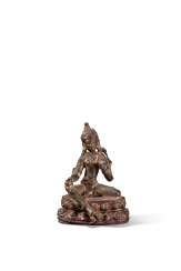 A GILT-BRONZE FIGURE OF TARA A GILT-BRONZE FIGURE OF TARA