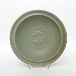Exceptionally rare 'Twin Fish'bowl with celadon glaze. CHINA. Probably Song Dynasty (960-1279) Exceptionally rare 'Twin Fish'bowl with celadon glaze. CHINA. Probably Song Dynasty (960-1279)