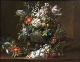 Lush Bouquet in a snake handle vase Lush Bouquet in a snake handle vase