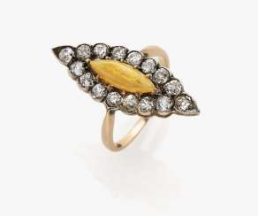 Marquis ring with an expressive fire opal and diamonds Marquis ring with an expressive fire opal and diamonds