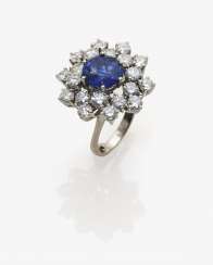 Entourage ring with sapphire and diamonds Entourage ring with sapphire and diamonds