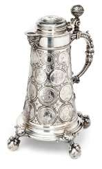 Big coin jug is made of silver Big coin jug is made of silver