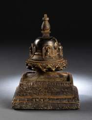 Votive Stupa with four Buddhas Votive Stupa with four Buddhas