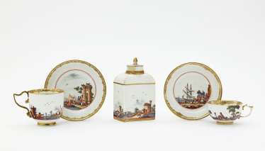 Tea caddy and two cups with saucers Tea caddy and two cups with saucers