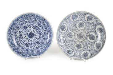 Two porcelain plates with blue-and-white decor Two porcelain plates with blue-and-white decor
