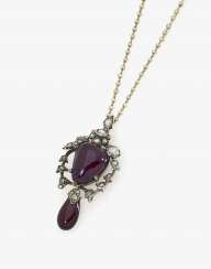 Orient pearl necklace with garnet and diamond pendant. Paris and England, around 1870 Orient pearl necklace with garnet and diamond pendant. Paris and England, around 1870