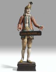 A POLYCHROME AND GILTWOOD FIGURE OF A GENTLEMAN A POLYCHROME AND GILTWOOD FIGURE OF A GENTLEMAN