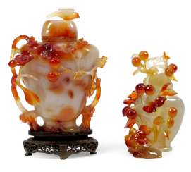 Two floral carved lid vases made of agate Two floral carved lid vases made of agate
