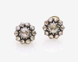 A Couple of the Entourage clip-on earrings with diamond roses A Couple of the Entourage clip-on earrings with diamond roses